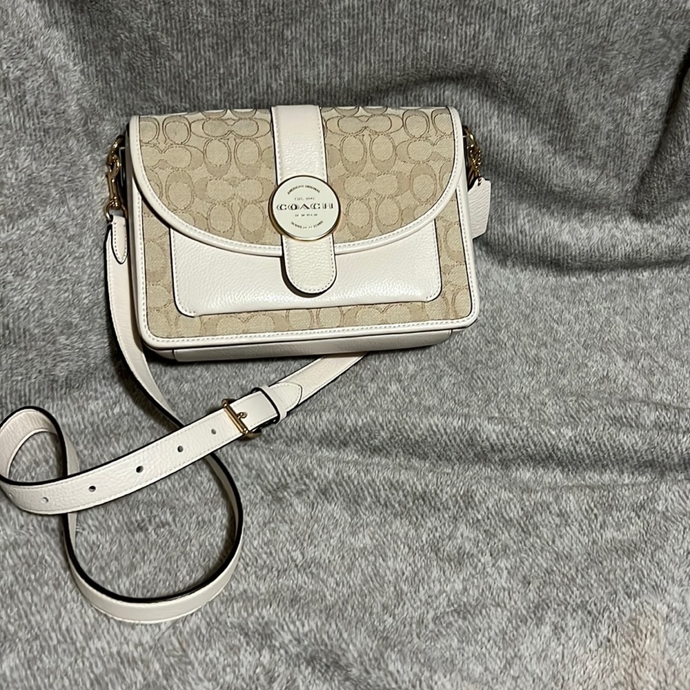 Coach Purse. Like new condition. Neutral color goes with all outfits.